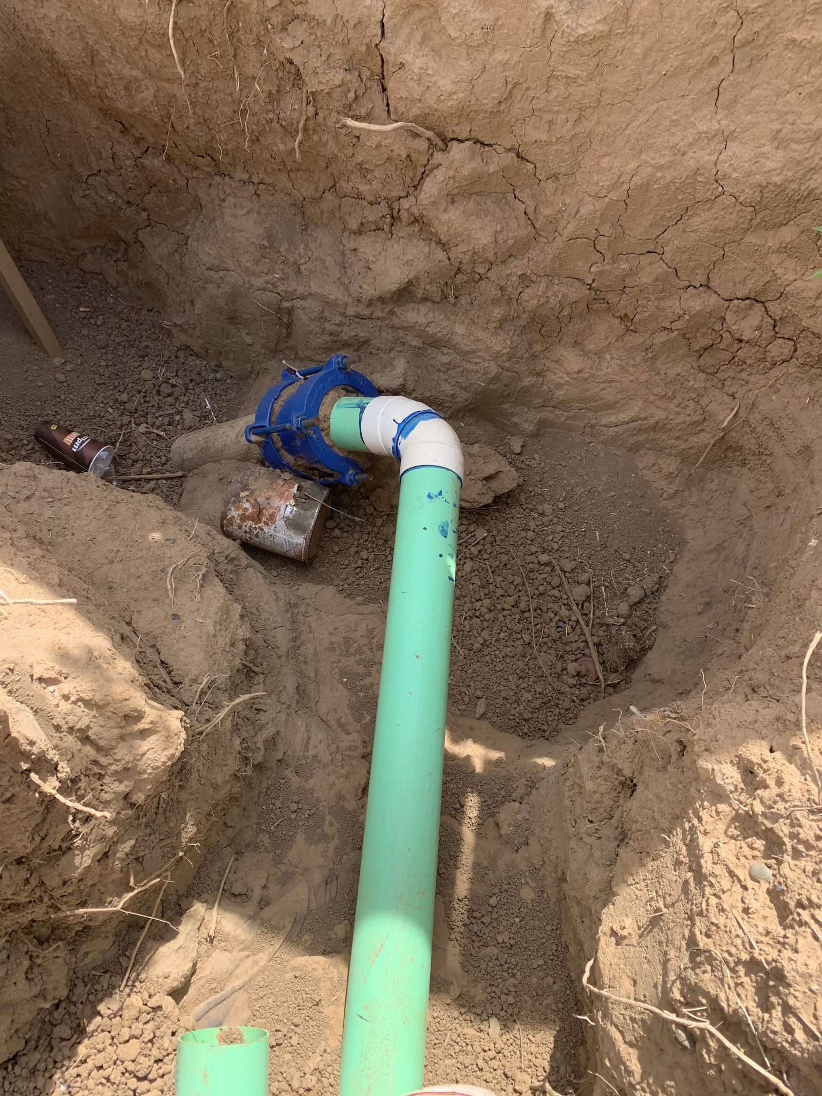 Sewer Cleanout Install — PVC cleanout being installed at the property line — gives future access without digging up the yard.